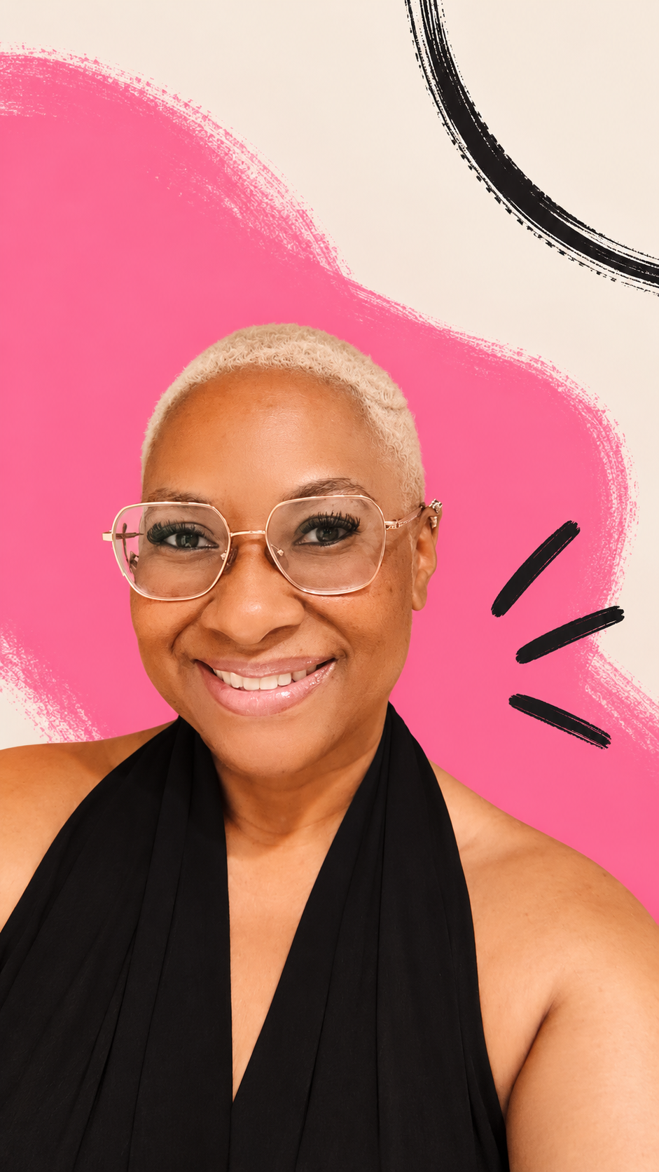 Mel smiling in glasses against a pink backdrop